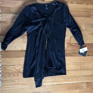 Black dress shirt with removable necklace.